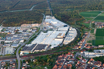 Erweiterungs - Neubau - Baustelle an den Gebäuden und Produktionshallen des Werksgelände der SEW-EURODRIVE GmbH & Co KG in Graben-Neudorf im Bundesland Baden-Württemberg, Deutschland aus der Vogelperspektive