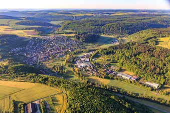 Ortsansicht aus Norden am Morgen mit Industriegebiet Zum Schlag mit Rekuplast GmbH,  Uebe Medical GmbH und TFA Dostmann GmbH & Co. KG im Ortsteil Waldenhausen in Wertheim im Bundesland Baden-Württemberg, Deutschland