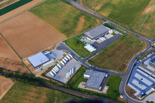 Luftbild von Industriegebiet Im Speyerer Tal mit Resinnovation GmbH, Markthalle 5 und TRANSAC Intern. Speditionsgesellschaft mbH in Rülzheim im Bundesland Rheinland-Pfalz, Deutschland