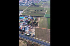 Drohnenaufname von Gewerbegebiet In der Nauroth in Ellerstadt im Bundesland Rheinland-Pfalz, Deutschland