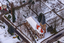Wolfsgangskirche bei Schnee in Freckenfeld im Bundesland Rheinland-Pfalz, Deutschland