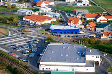 Nordring mit Edeka Fitterer und Peugeot Autohaus Grün in Rülzheim im Bundesland Rheinland-Pfalz, Deutschland